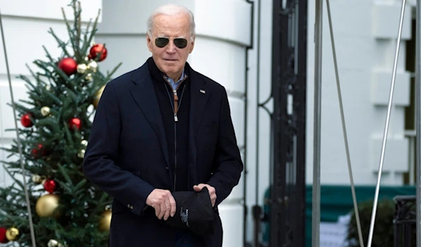 President Joe Biden walks towards the members of the media as he leaves the White House to spend the Christmas holiday with his family at Camp David presidential retreat, Dec. 23, 2023. (AP)