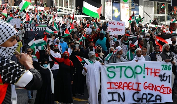 South Africans protest against Israeli occupation's aggression on Gaza, outside the parliament in Cape Town, South Africa, May 12, 2021 (AP)