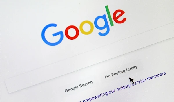 A cursor moves over Google's search engine page, in Portland, Ore., on Aug. 28, 2018 (AP)