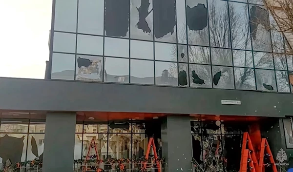 In this photo taken from video released by Russia Emergency Situations Ministry telegram channel on Saturday, Dec. 30, 2023, a building damaged after shelling is seen in Belgorod, Russia. (AP)