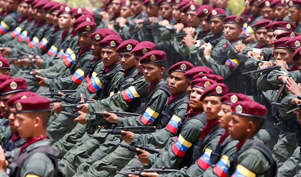 Soldiers march during a military parade marking the country's Independence Day in Caracas, Venezuela, Wednesday, July 5, 2017 (AP)