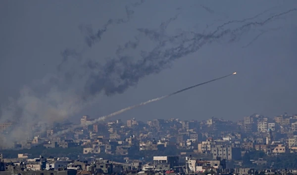 Rockets are fired toward regime-occupied territories from the Gaza Strip, Friday, Dec. 1, 2023. (AP Photo/Ariel Schalit)