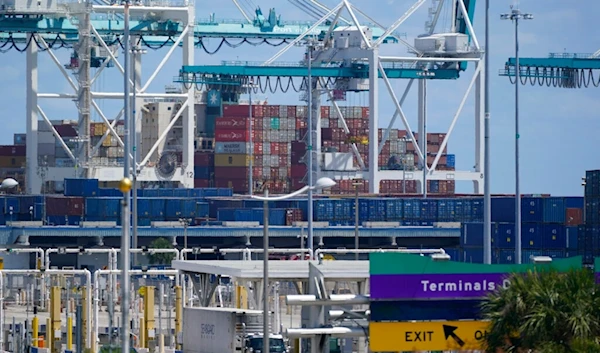 In this April 9, 2021 photo, cargo containers are shown stacked near cranes at PortMiami in Miami. (AP)