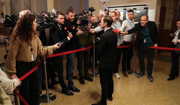 Denmark's Minister of Justice Peter Hummelgaard talks to the media after a vote on a new law against inappropriate treatment religious texts, in Copenhagen, Denmark on December 7, 2023. (AP)