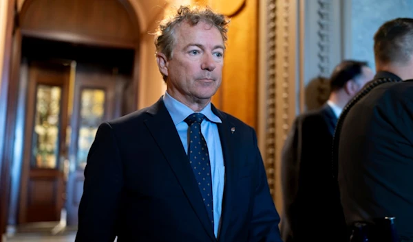 Sen. Rand Paul, R-Ky., and other senators arrive at the chamber for votes, at the Capitol in Washington, Wednesday, Sept. 6, 2023. (AP Photo/J. Scott Applewhite)