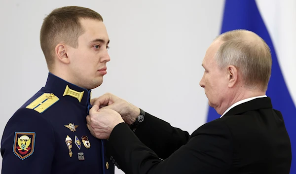 Russian President Vladimir Putin during a ceremony at the St. George Hall of the Grand Kremlin Palace in Moscow, Russia, Friday, Dec. 8, 2023. (Valery Sharifulin, Sputnik, Kremlin Pool Photo via AP)