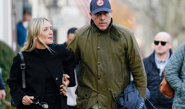 Hunter Biden walks with wife Melissa Cohen as they visit shops in Nantucket, Mass., Nov. 24, 2023. (AP)