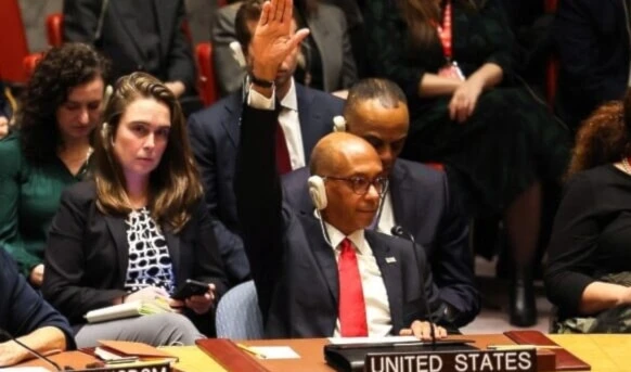 US Ambassador Alternate Representative of the US for Special Political Affairs in the United Nations Robert A. Wood raises his hand during a United Nations Security Council meeting on Gaza, at UN headquarters in New York City on December 8, 2023. (AFP)