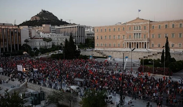 Members of the Greek Communist Party (KKE) take part in a demonstration against government plans to regulate street protests, in front of the parliament building in Athens, Greece, July 2, 2020 (Reuters)