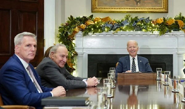 US President Joe Biden and House Speaker Kevin McCarthy (far left) in November during a meeting at the White House (AP)