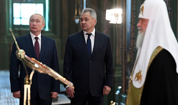 Russian President Vladimir Putin, Defense Minister Sergei Shoigu and Patriarch Kirill visit the newly constructed Resurrection of Christ Cathedral, the main Orthodox Cathedral of the Russian Armed Forces, near Moscow last June. (AFP)