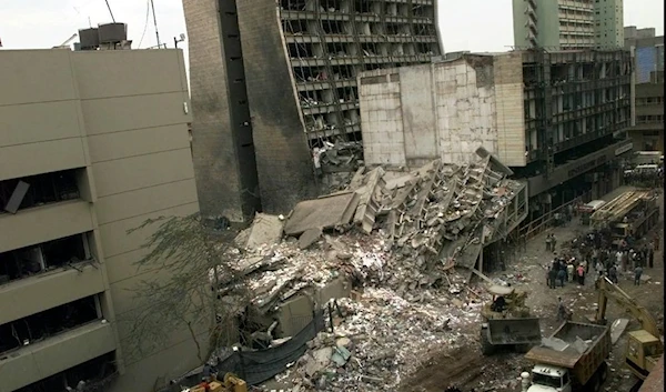 In this Aug. 8, 1998 file photo, the United States Embassy, left, and other damaged buildings in downtown Nairobi, Kenya, are shown on the day after it was bombed by terrorists. (AP)