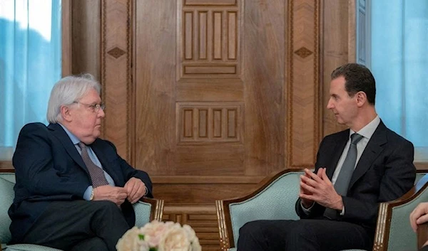 In this photo released on the official Facebook page of the Syrian Presidency, Syrian President Bashar al-Assad, right, meets with Martin Griffiths, United Nations Under-Secretary-General for Humanitarian Affairs, in Damascus, Syria, Feb. 13, 2023.