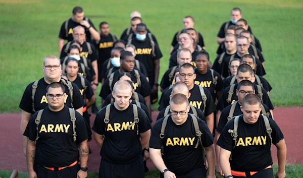 Students in the new Army Prep Course march after morning physical training at Fort Jackson in Columbia, S.C. Saturday, Aug. 27, 2022 (AP Photo/Sean Rayford)