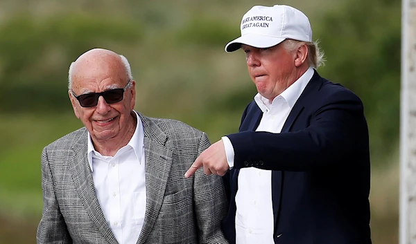 Billionaire Rupert Murdoch and former US president Donald Trump at the latter's Golf Links court in 2016 (Reuters)