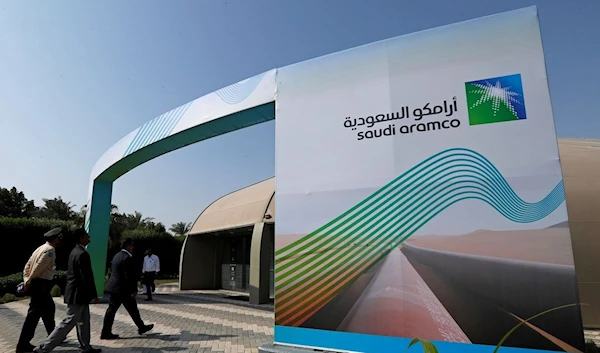 The logo of the Saudi Aramco at a press conference in Saudi Arabia in November 2019 (Reuters)