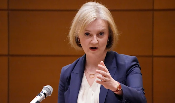 Former British Prime Minister Liz Truss delivers speech during a symposium of the Inter-Parliamentary Alliance on China at the Diet Members Building in Tokyo on Friday, Feb. 17, 2023 (AP).