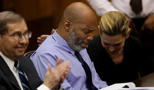 Lamar Johnson reacts after Judge David Mason overturned his murder conviction on Tuesday. (AP)