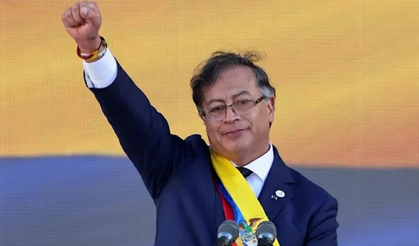 Gustavo Petro gestures during his swearing-in ceremony at Plaza Bolivar, in Bogota, Colombia, August 7, 2022. (Reuters)