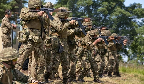 New recruits to the Ukrainian army are trained by UK army specialists at a military base near Manchester, England, Thursday, July 7, 2022. (AP)