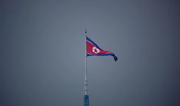 A North Korean flag flutters at the propaganda village of Gijungdong in North Korea, July 19, 2022. (Reuters)/