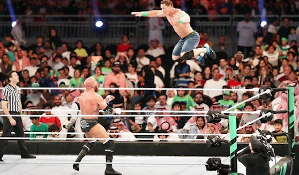 John Cena, right, in action against Triple H at the show in Jeddah on April 27, 2018. (AFP)