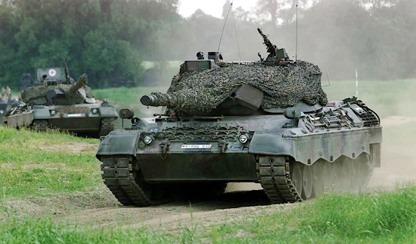 A Leopard 1 tank drives in Storkau, Germany, on May 19, 2000 (AP Photo/Eckehard Schulz, File)