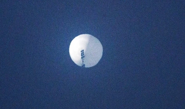 A balloon in the sky over Billings, Mont., in images taken Feb. 1. (Getty Images)