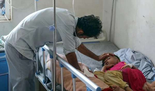 A child in Yemen receiving treatment in March 2019 (AFP)