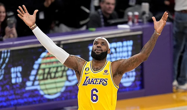 Los Angeles Lakers forward LeBron James celebrates after scoring to become the NBA's all-time leading scorer during the second half of a basketball game against the Oklahoma City Thunder, Los Angeles, February 7, 2023. (AP)