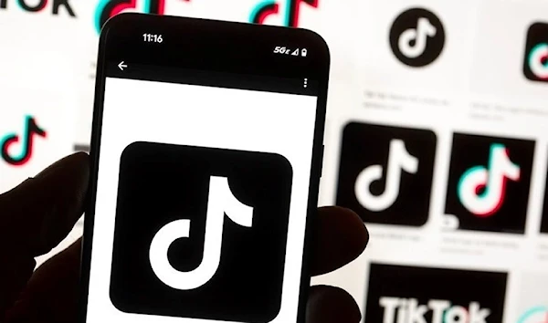 The TikTok logo is seen on a cell phone. (AP)