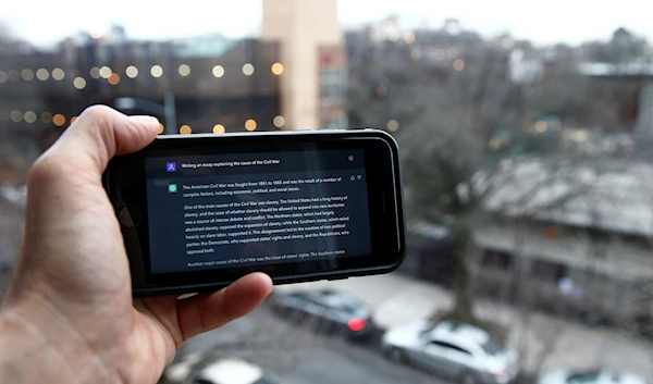 A ChatGPT prompt is shown on a device near a public school in Brooklyn, New York, Thursday, January 5, 2023 (AP Photo)