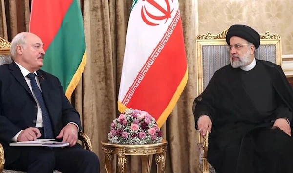 Belarusian President Alexander Lukashenko (L) meets Iranian President Ibrahim Raisi in Tehran on March 13, 2023. (Iranian Presidency)