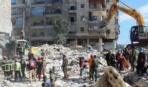 Members of the Algerian rescue team and Syrian army soldiers search for survivors at the site of a damaged building, in the aftermath of the earthquake in Aleppo, Syria February 8, 2023. (REUTERS)