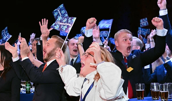 Supporters of the Sweden Democrats political party cheering during the election night rally in September 2022 (AFP)