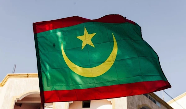 The Mauritanian national flag in Nouakchott on 2 April 2019 (AFP)