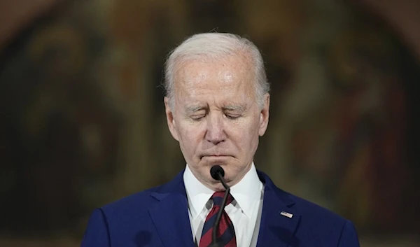 US President Joe Biden standing for a moment of silence for those affected by gun violence in Washington in December 2020 (AP)