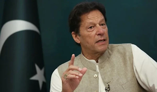 Former Pakistani Prime Minister Imran Khan speaking at a press conference (Reuters)