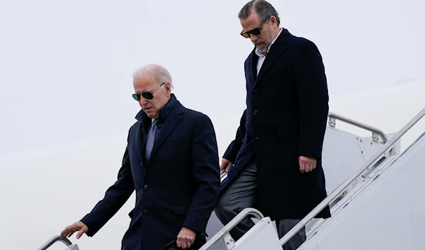 President Joe Biden and his son Hunter Biden step off Air Force One at Hancock Field Air National Guard Base in Syracuse, New York, February 4, 2023 (AP Photo)