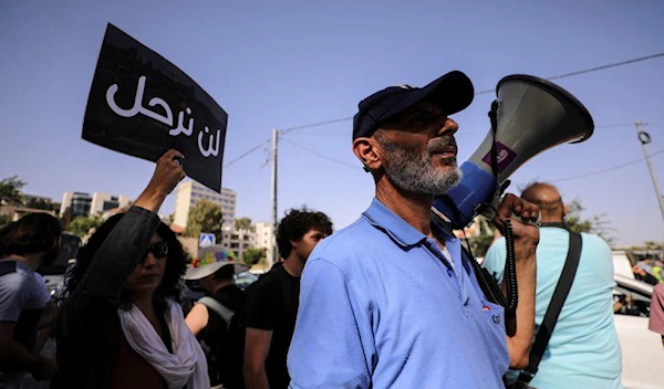 Saleh Abu Diab, a Palestinian resident of Sheikh Jarrah, takes part in a protest against his possible eviction after an Israeli court accepted Jewish settler land claims, in his neighborhood in East Jerusalem June 11, 2021 (Reuters).