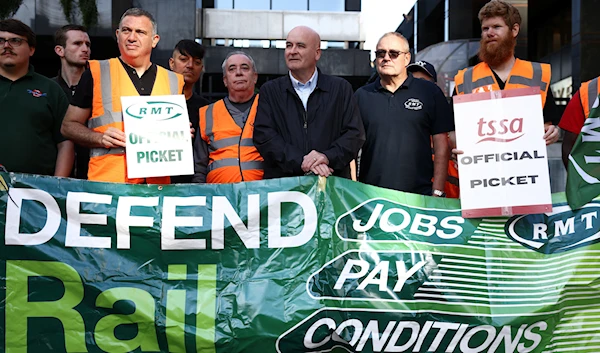 Mick Lynch, General Secretary of the National Union of Rail, Maritime and Transport Workers joins other union members on strike at a picket line outside Euston railway station in London, Britain, August 20, 2022 (Reuters).