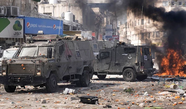 Confrontations in the Palestinian city of Nablus during Israeli Occupation Forces raid on February 24, 2023 (AP).