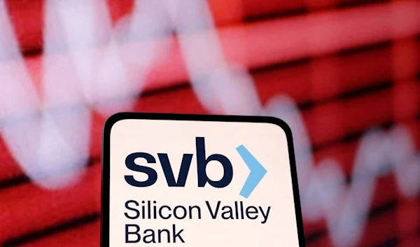 The SVB logo and a decreasing stock graph are seen in this illustration taken March 10, 2023. (Reuters)