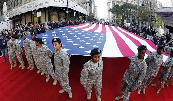 Members of the Army march up 5th Avenue during the Veterans Day Parade in New York November 11, 2012. (Reuters)