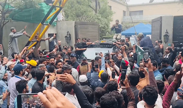 Police storm Imran Khan's Lahore residence as he heads to court