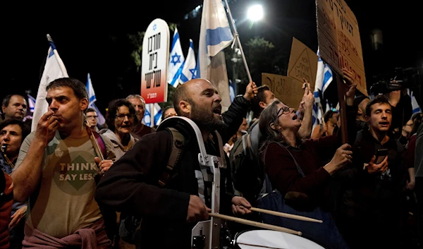 Israelis protest against plans by Prime Minister Benjamin Netanyahu's new government to overhaul the judicial system, in Jerusalem, Wednesday, March 1, 2023. (AP)