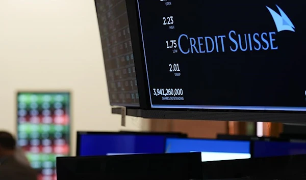 A sign displays the name of Credit Suisse on the floor at the New York Stock Exchange in New York, Wednesday, March 15, 2023. (AP)