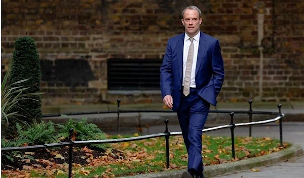 Dominic Raab walks outside Number 10 Downing Street, in London, Britain, October 25, 2022. (REUTERS)