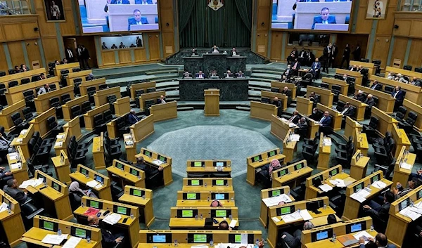 Members of parliament attend a parliament session ​in Amman, Jordan January 6, 2022 (Reuters)