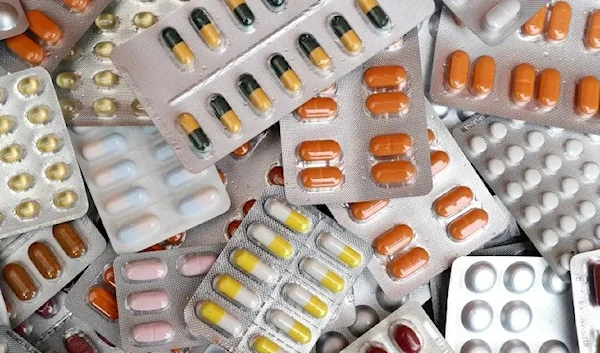 Illustrative photo shows various medicine pills in their original packaging. (Reuters)